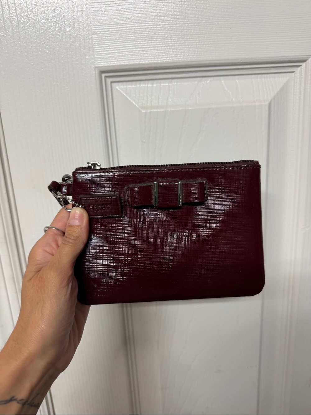 Coach Burgundy Patent Leather Wristlet with Bow Accent